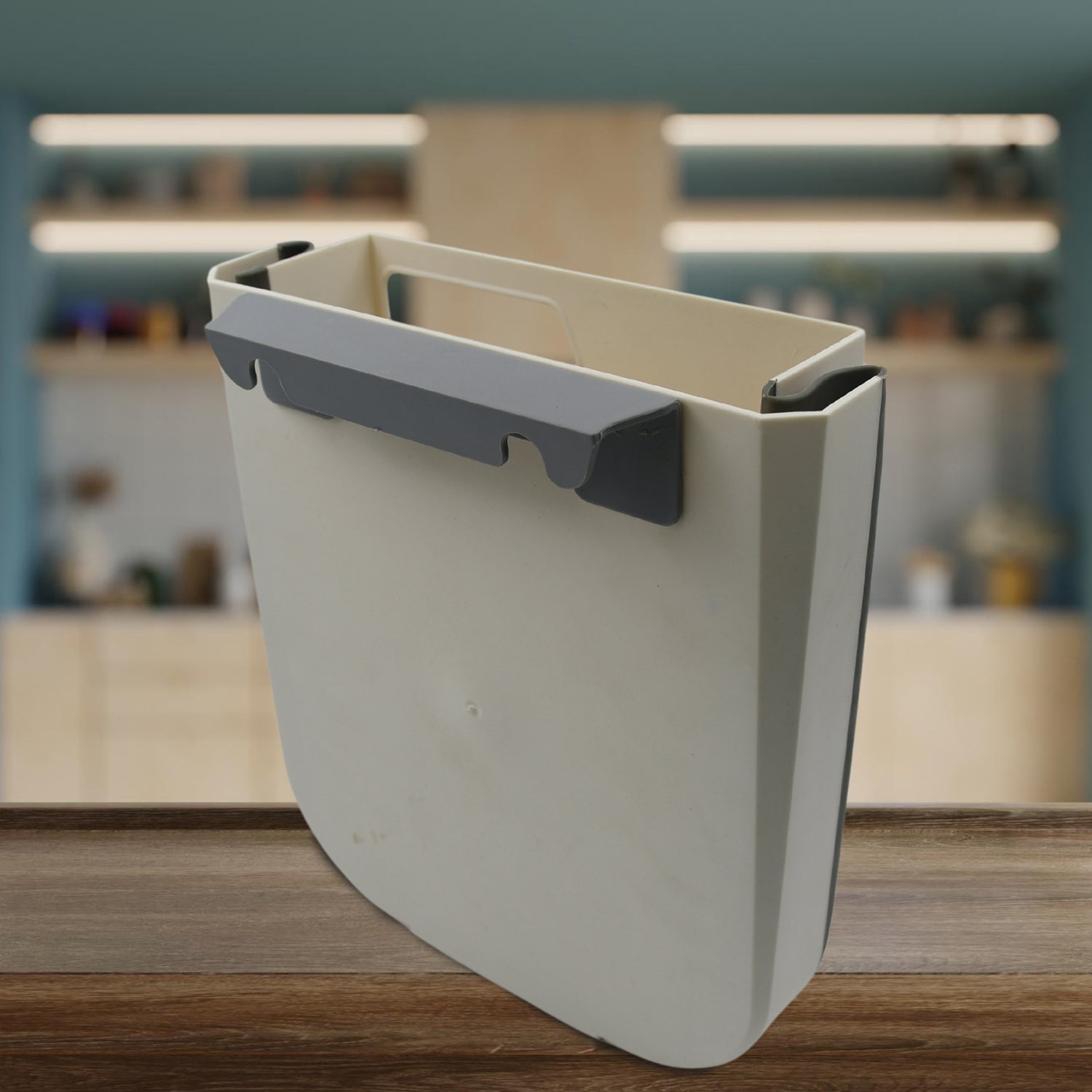 Wukusy small foldable hanging trash can for kitchen cabinet door, suitable for bathroom, bedroom, office, or car use.