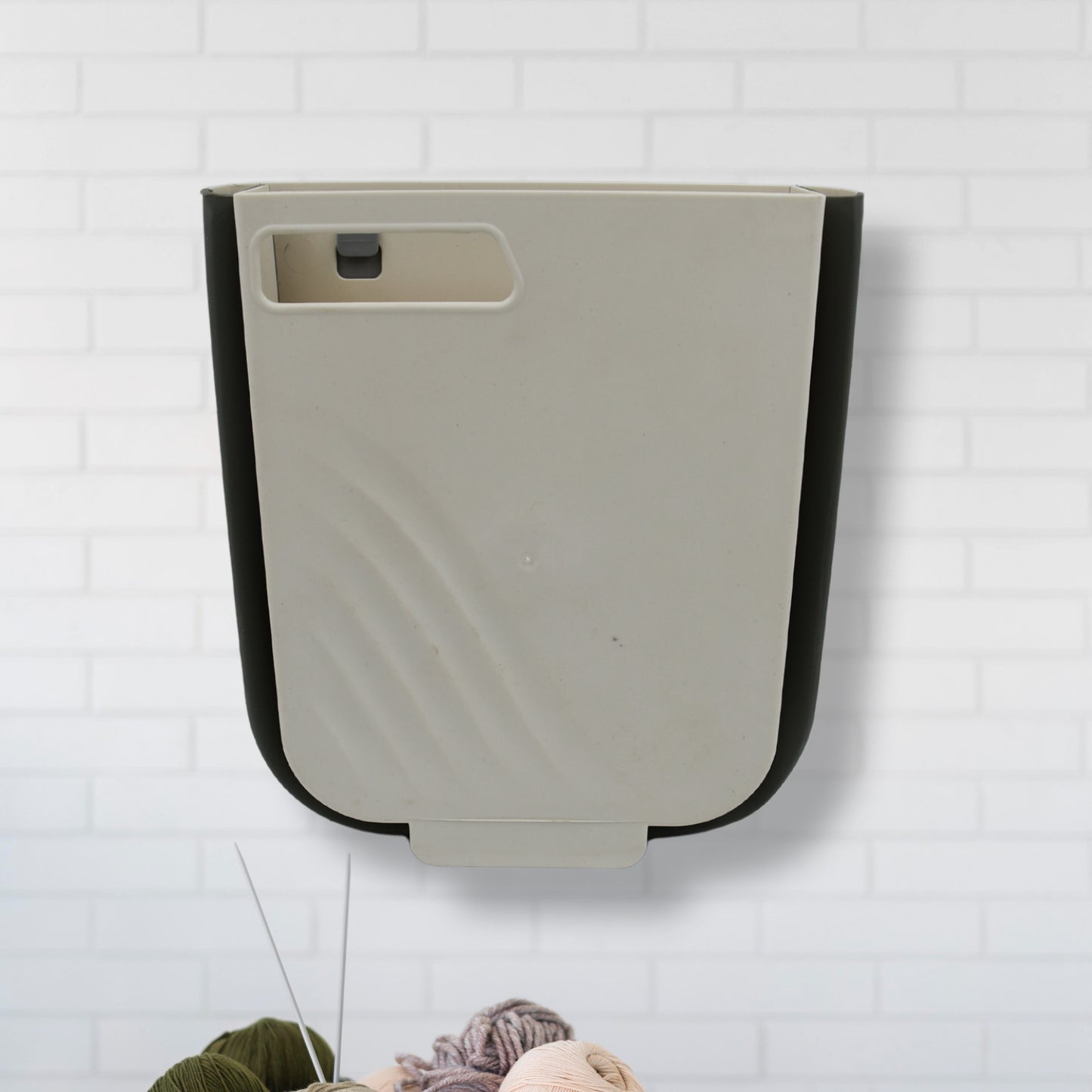 Wukusy small collapsible hanging trash can for kitchen cabinet doors, ideal for bathroom, bedroom, office, and car use.