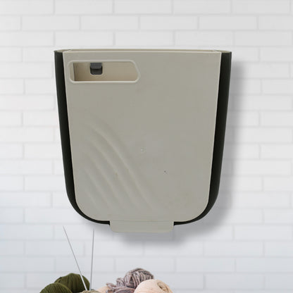 Wukusy small collapsible hanging trash can for kitchen cabinet doors, ideal for bathroom, bedroom, office, and car use.