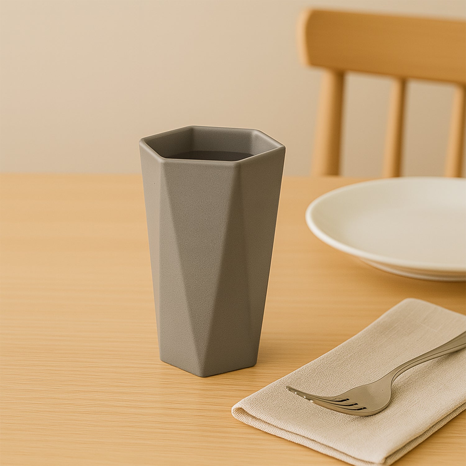 Small hexagon-shaped plastic drinking glass by Wukusy, ideal for casual home and kitchen use.