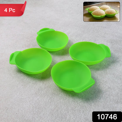 Wukusy 4-pack food-grade silicone idli maker cups for non-stick idli, dhokla, and egg poaching in a home kitchen.