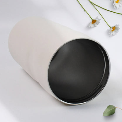 Wukusy insulated stainless steel water bottle, 500ml, with a sleek silver design for home and kitchen use.