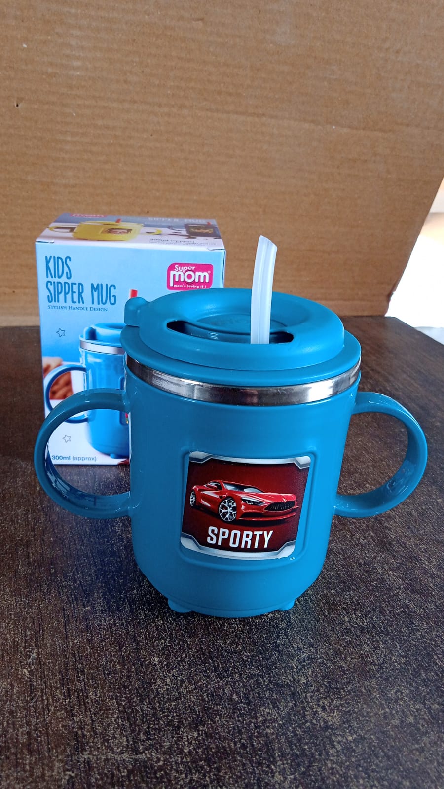 Kids Sporty Sipper Mug with straw and dual handles by Wukusy, featuring a colorful design and 300ml capacity for children.
