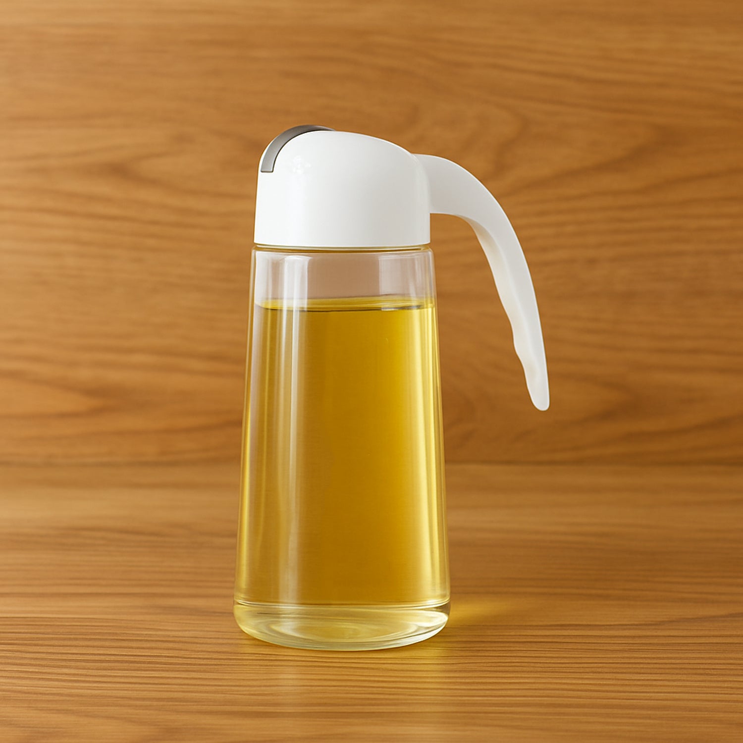Wukusy glass oil dispenser bottle for kitchen, automatic opening and closing, holds 630ml of oil, vinegar, honey, or olive oil.