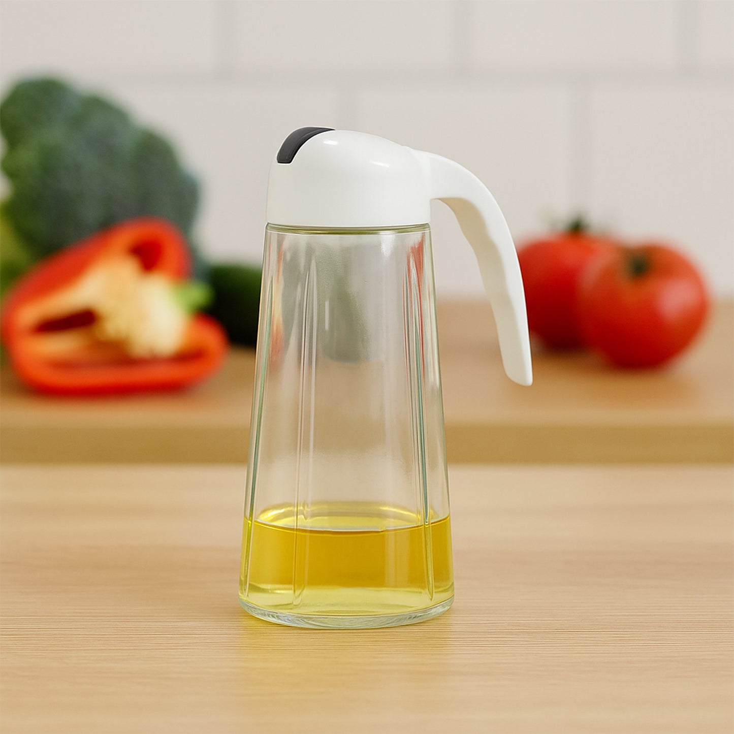 Wukusy glass oil dispenser bottle with automatic opening and closing, 630ml for oil, vinegar, honey, and olive oil in kitchen.