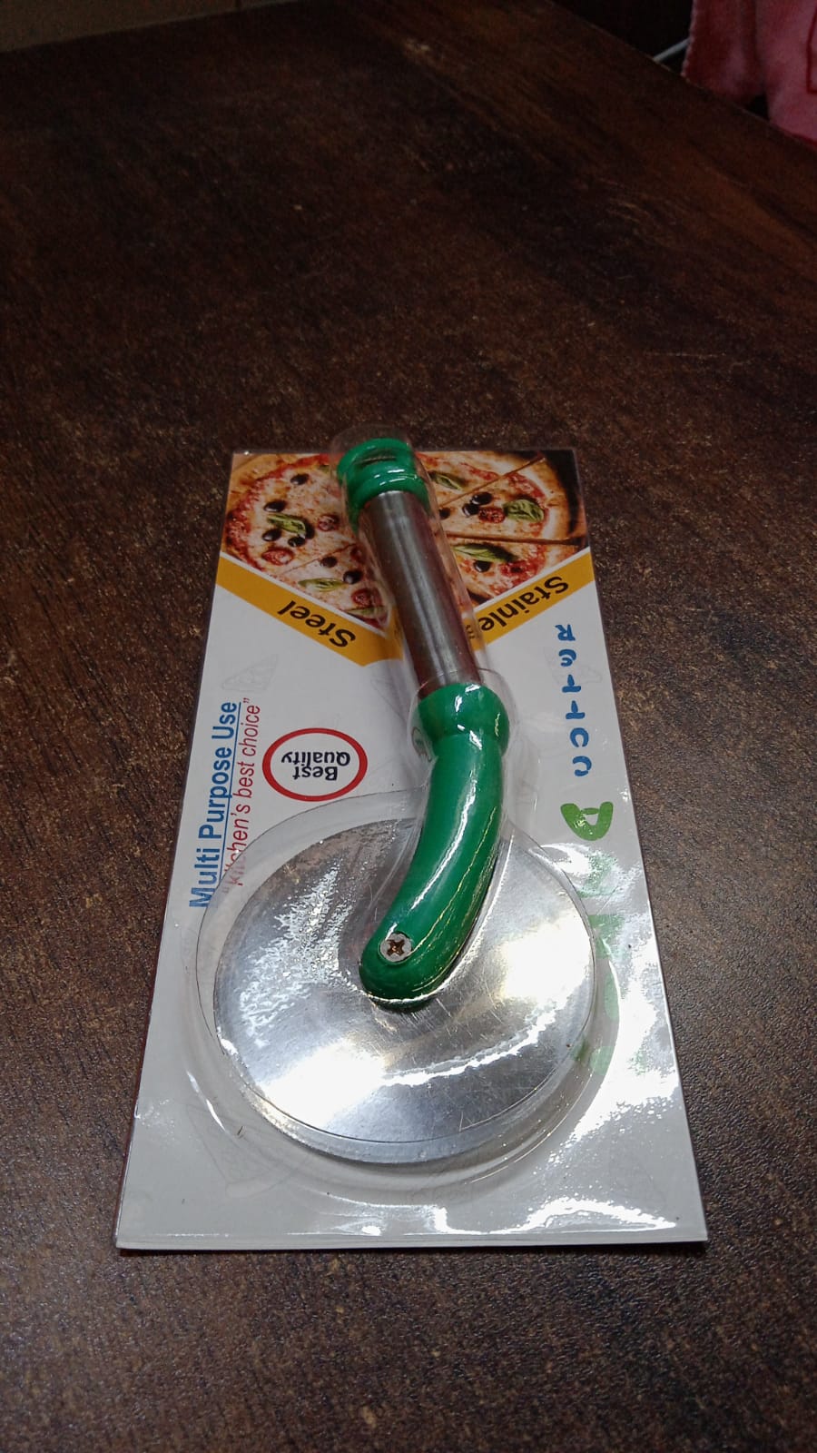 Wukusy stainless steel wheel pizza cutter for home kitchen use, featuring a sharp circular blade for easy pizza slicing.