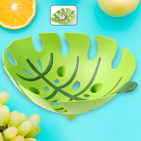 Leaf-shaped plastic fruit basket by Wukusy, designed for home and kitchen storage, with a decorative leaf design.
