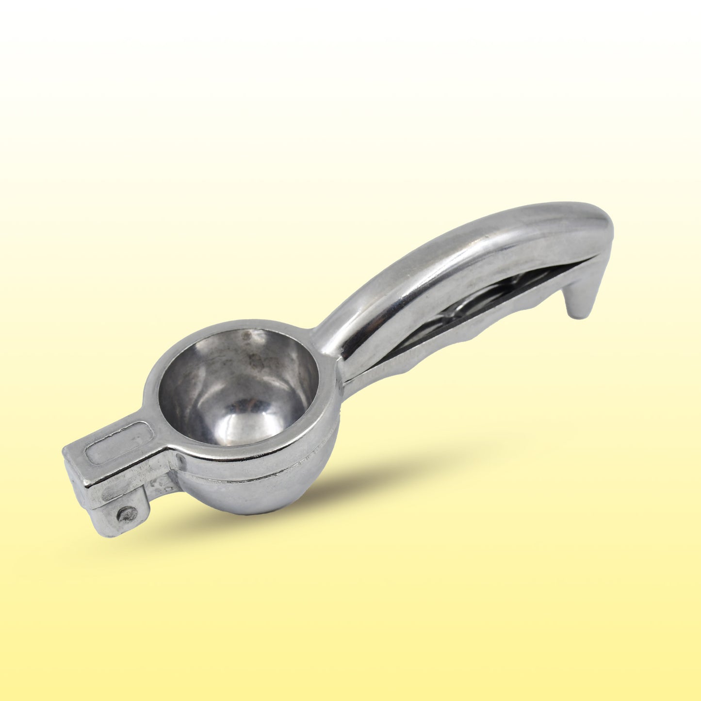 Steel lemon squeezer by Wukusy for home and kitchen use, featuring a durable design and polished finish for effortless juice extraction.