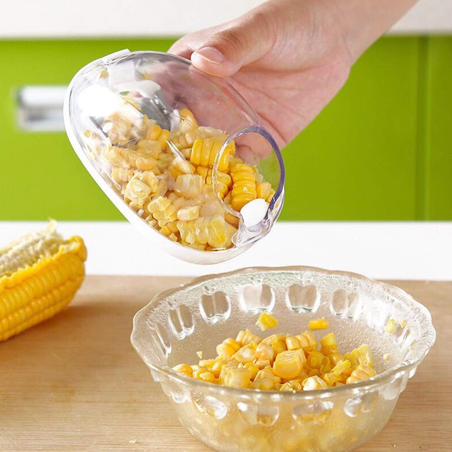 Wukusy Magic Plastic Corn Remover with Steel Blades, kitchen tool for safely stripping corn kernels from cob.