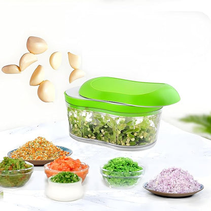 Wukusy manual hand push garlic cutter and vegetable chopper for kitchen use, featuring stainless steel blades and ergonomic handle.