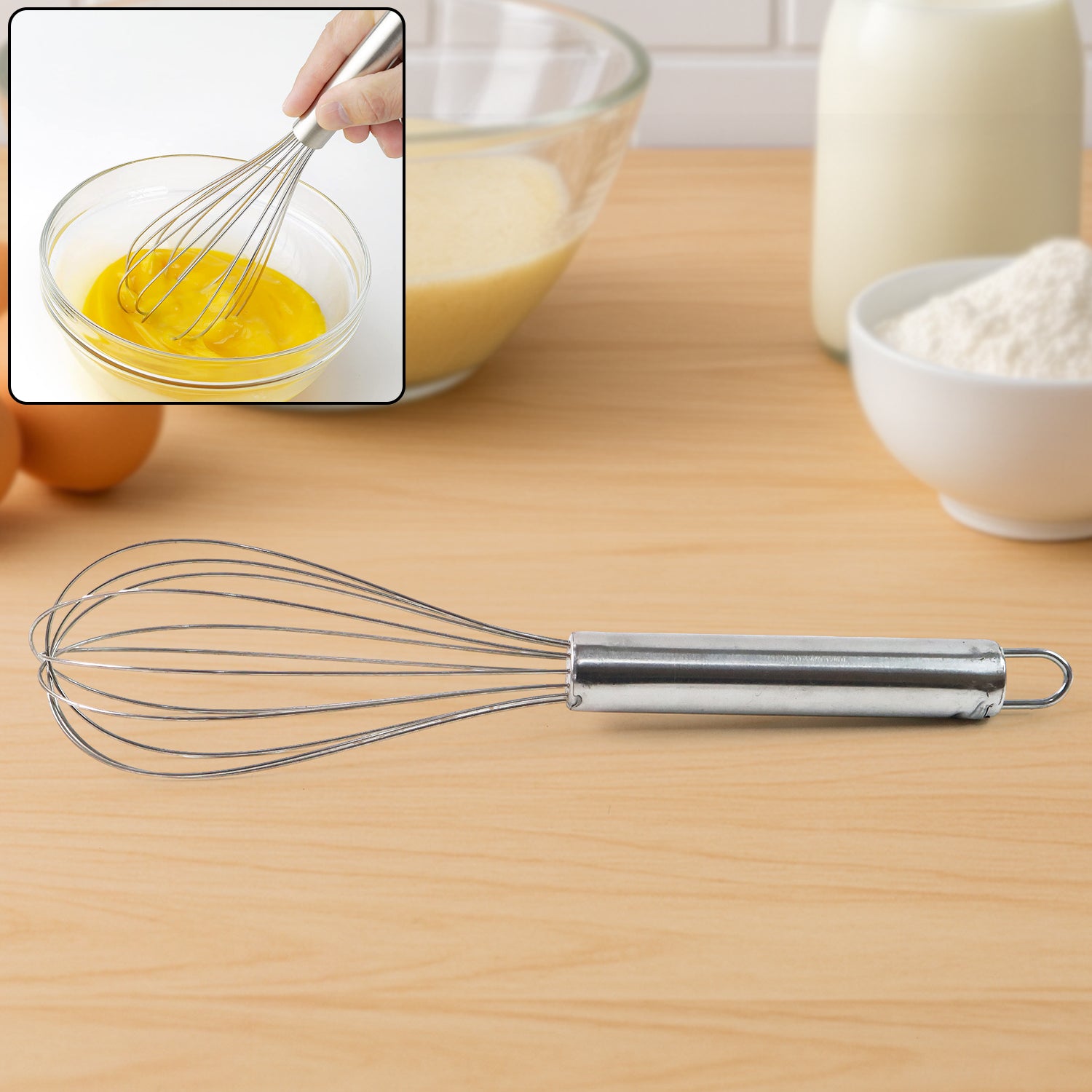 Medium stainless steel balloon whisk by Wukusy, 24cm, ideal for mixing and whipping in the kitchen.