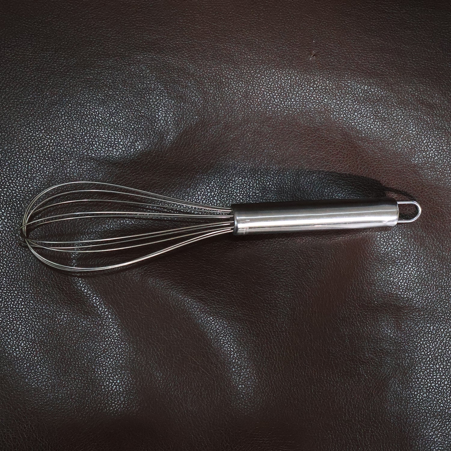 Medium stainless steel balloon whisk by Wukusy, 24cm for mixing and whisking in home and kitchen cooking tasks.