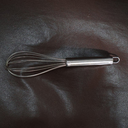 Medium stainless steel balloon whisk by Wukusy, 24cm for mixing and whisking in home and kitchen cooking tasks.