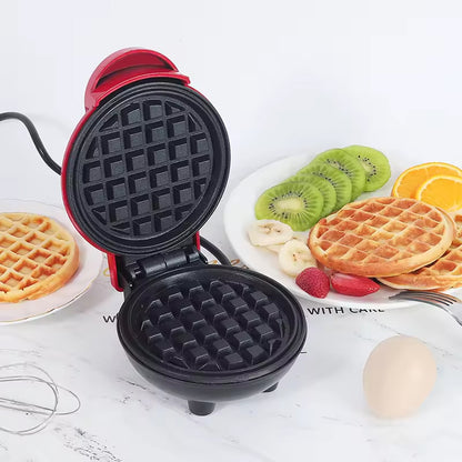 Wukusy mini waffle maker machine with non-stick surface, perfect for breakfast, desserts, sandwiches, and snacks in a home kitchen setting.