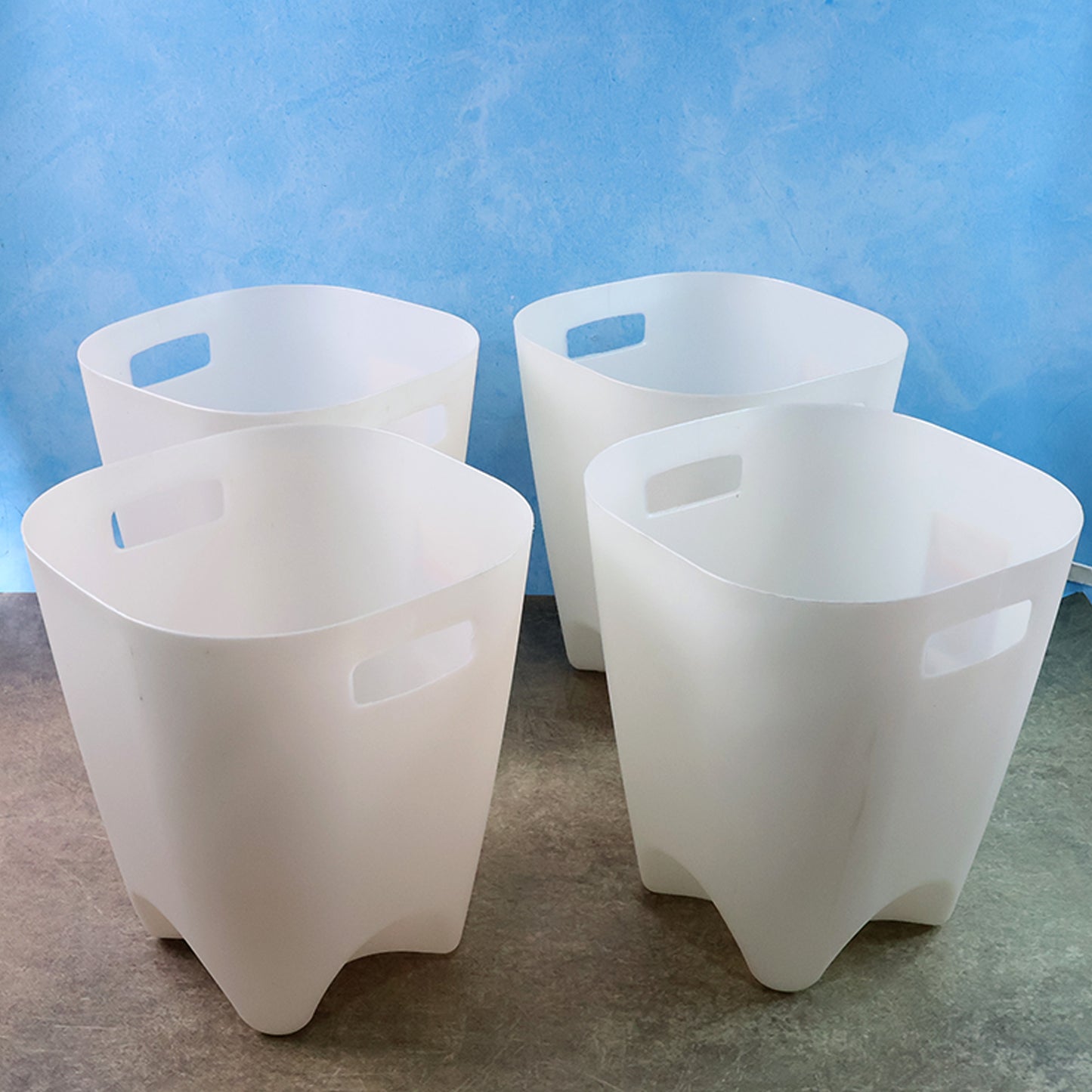 Set of four Wukusy modern plastic dustbins for waste paper, ideal for home and kitchen organization.