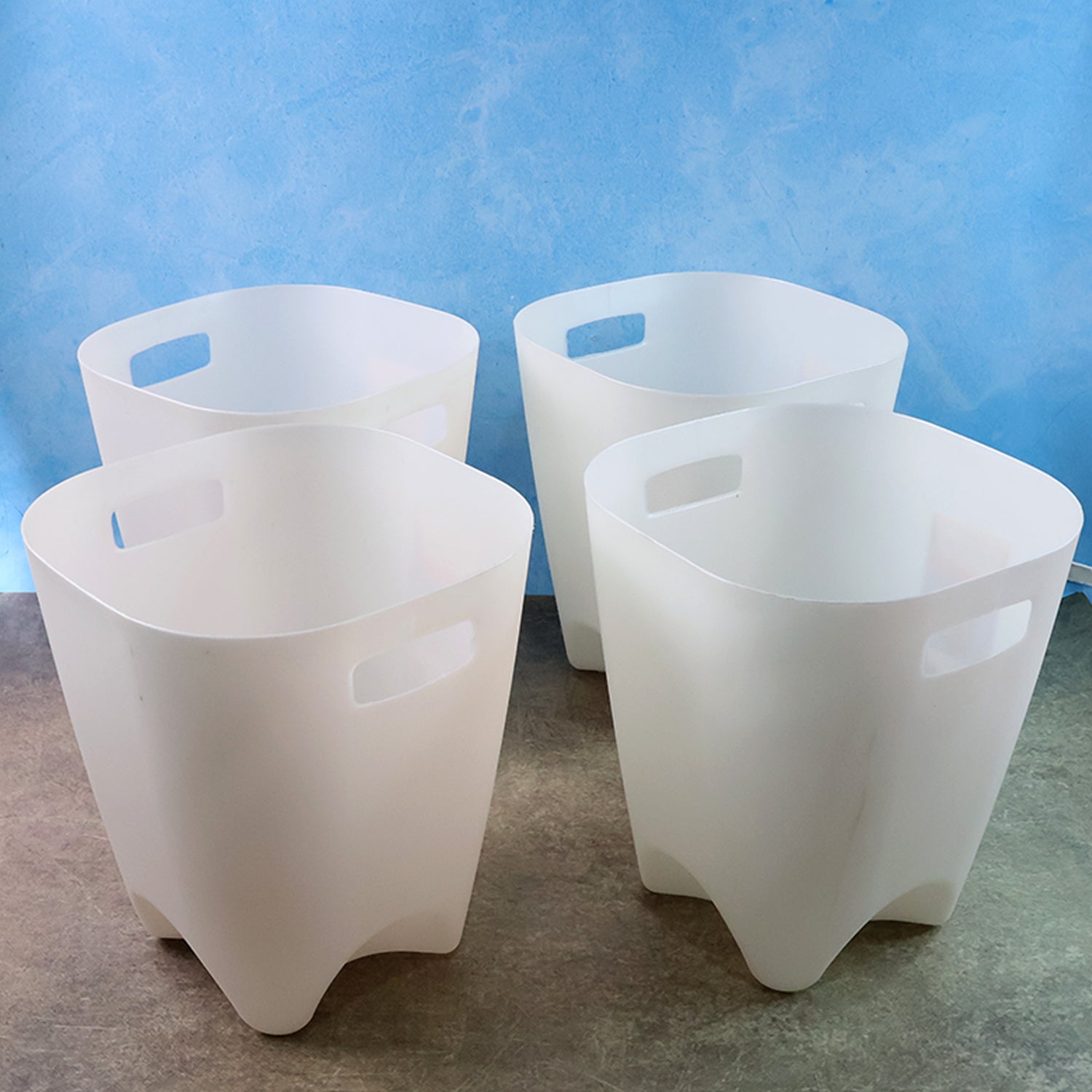 Set of four Wukusy modern plastic dustbins for waste paper, ideal for home and kitchen organization.