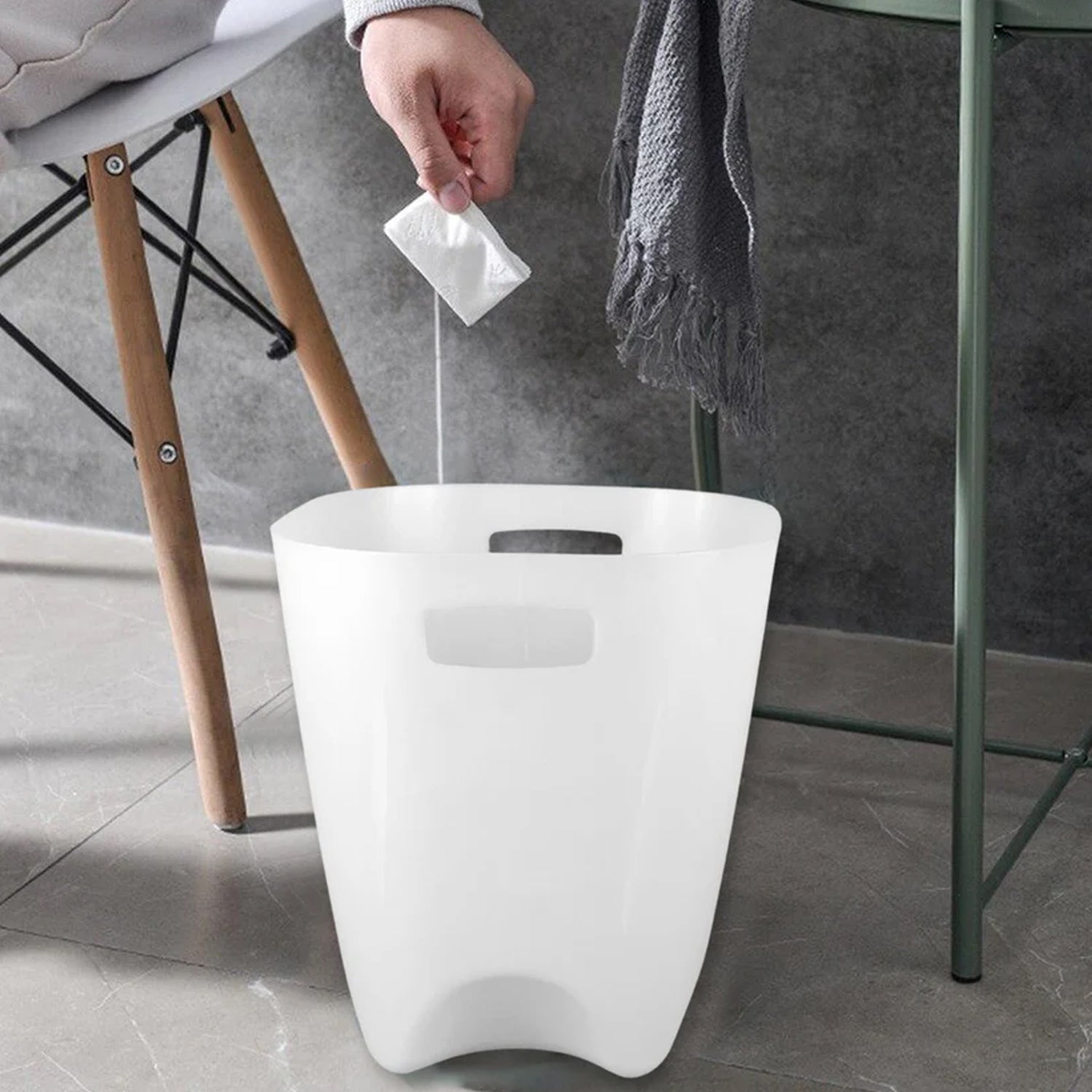 Set of four Wukusy modern plastic dustbins and waste paper baskets for home and kitchen use.