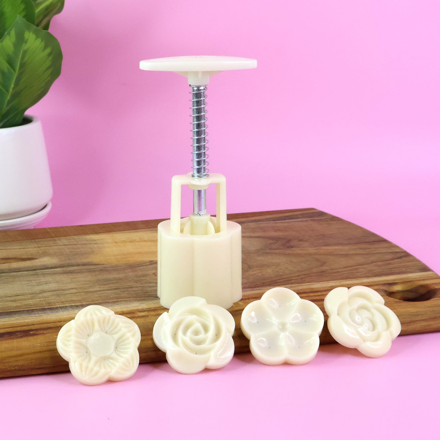 Wukusy mooncake press mold with four stamps set, kitchen tool for shaping and decorating mooncakes in home baking.