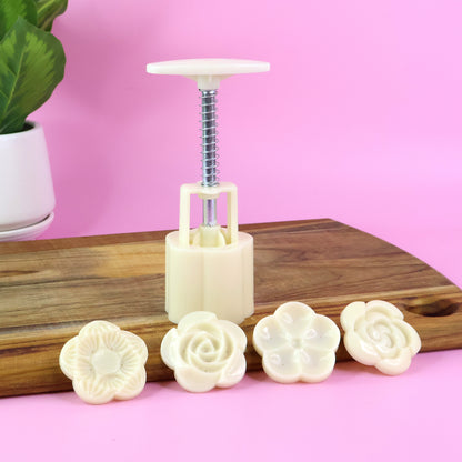 Wukusy mooncake press mold with four stamps set, kitchen tool for shaping and decorating mooncakes in home baking.