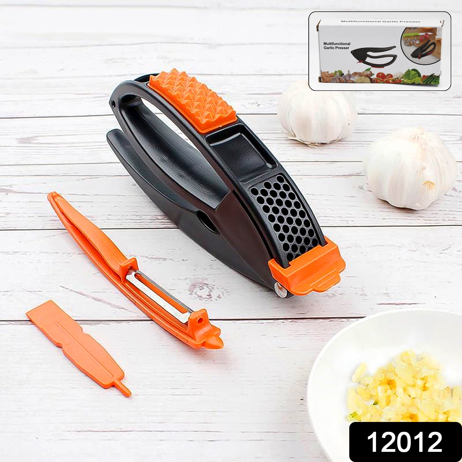 Wukusy multifunctional garlic press and mincing tool for crushing garlic easily in home kitchen.