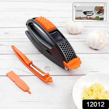 Wukusy multifunctional garlic press and mincing tool for crushing garlic easily in home kitchen.