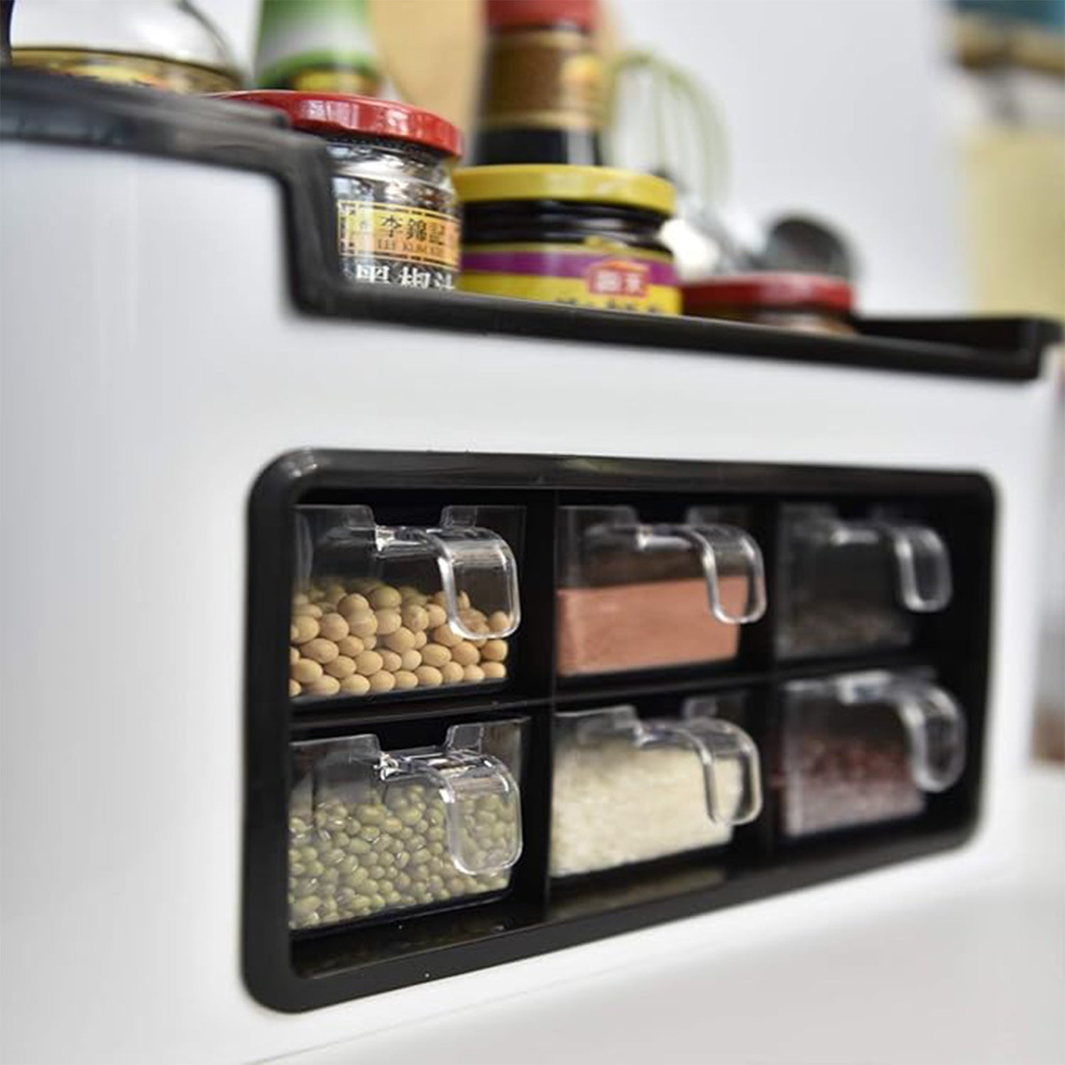Wukusy multifunctional kitchen storage organizer rack with 6 spice containers, knife and spoon holder, and top shelf for kitchen use.
