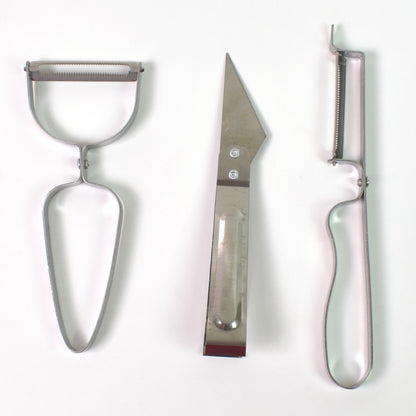 Wukusy 3-piece multifunctional peeler and grater set for vegetables and fruits, ideal for home kitchen use.