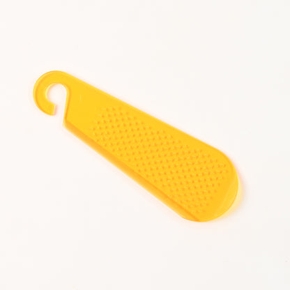 Wukusy multipurpose garlic and ginger grater peeler tool with hanging hook for kitchen use, made of durable stainless steel.