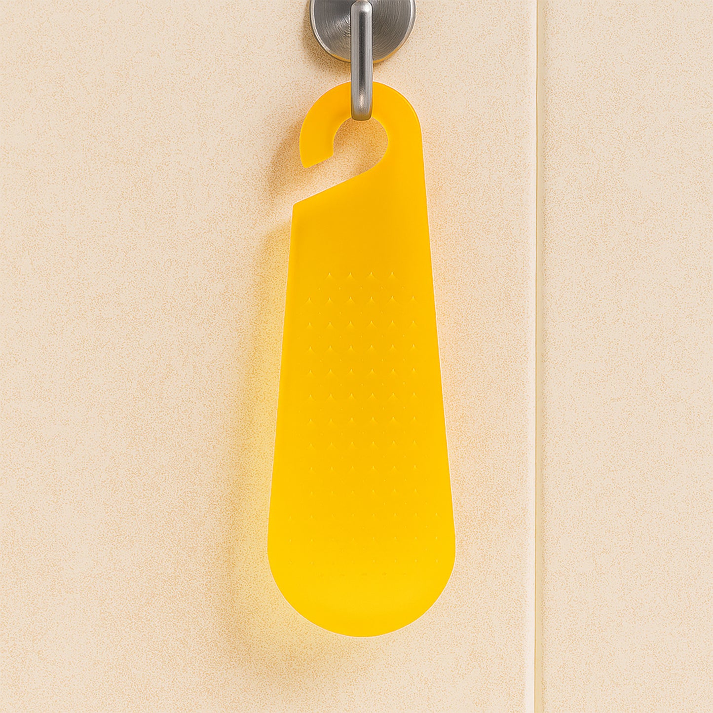 Wukusy multipurpose garlic and ginger grater peeler tool with hanging hook for kitchen prep, made of stainless steel and plastic.