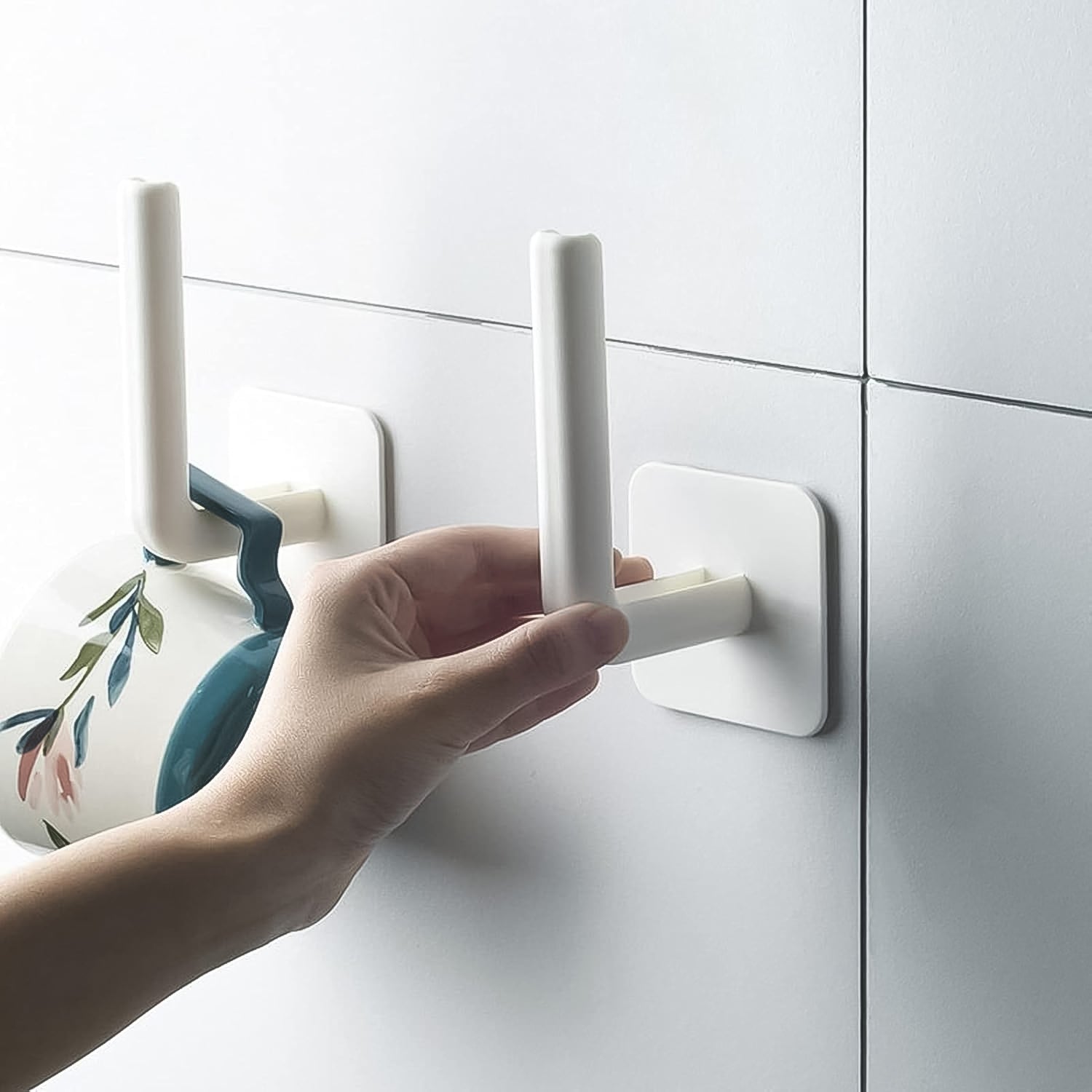 Wukusy multipurpose shelf organizer hanging storage rack set with two adhesive hooks, ideal for home and kitchen organization.