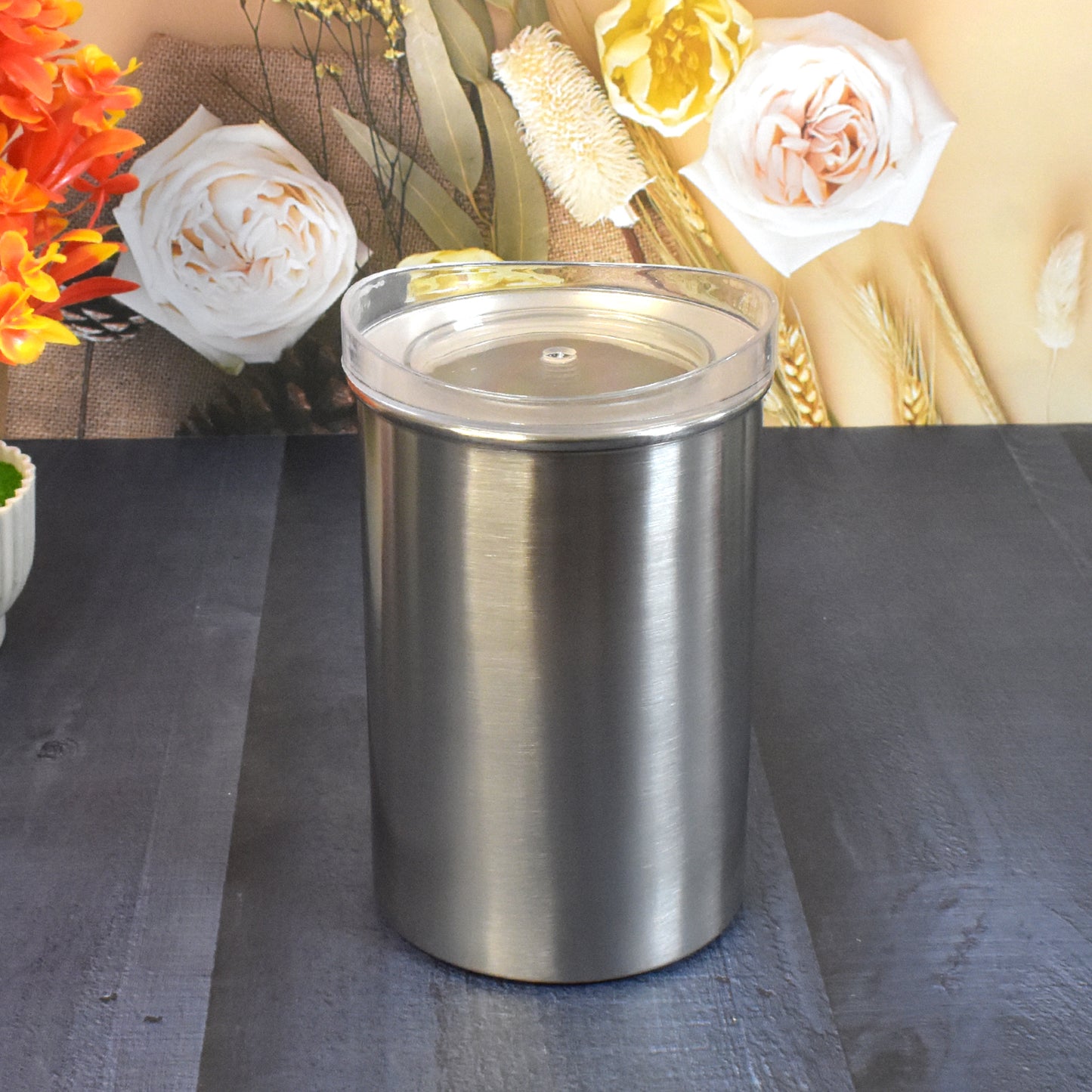 Wukusy stainless steel airtight container with see-through lid, 1000ml, ideal for kitchen storage and organization.