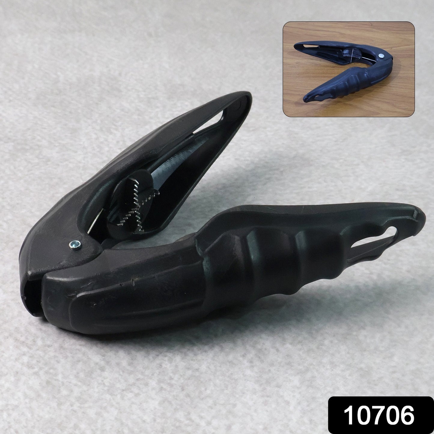 Wukusy multipurpose walnuts and seafood cracker tool for home kitchen use, showing the metal cracker in a countertop setting.