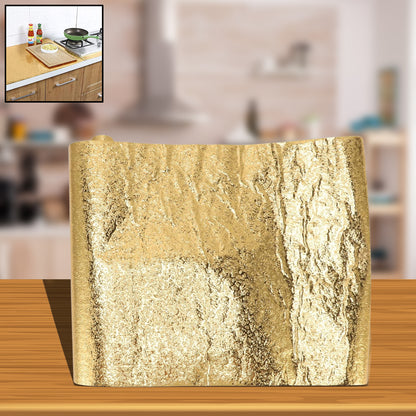 Golden aluminum foil waterproof self-adhesive oil-proof sticker for kitchen walls by Wukusy, 60cm x 2m.