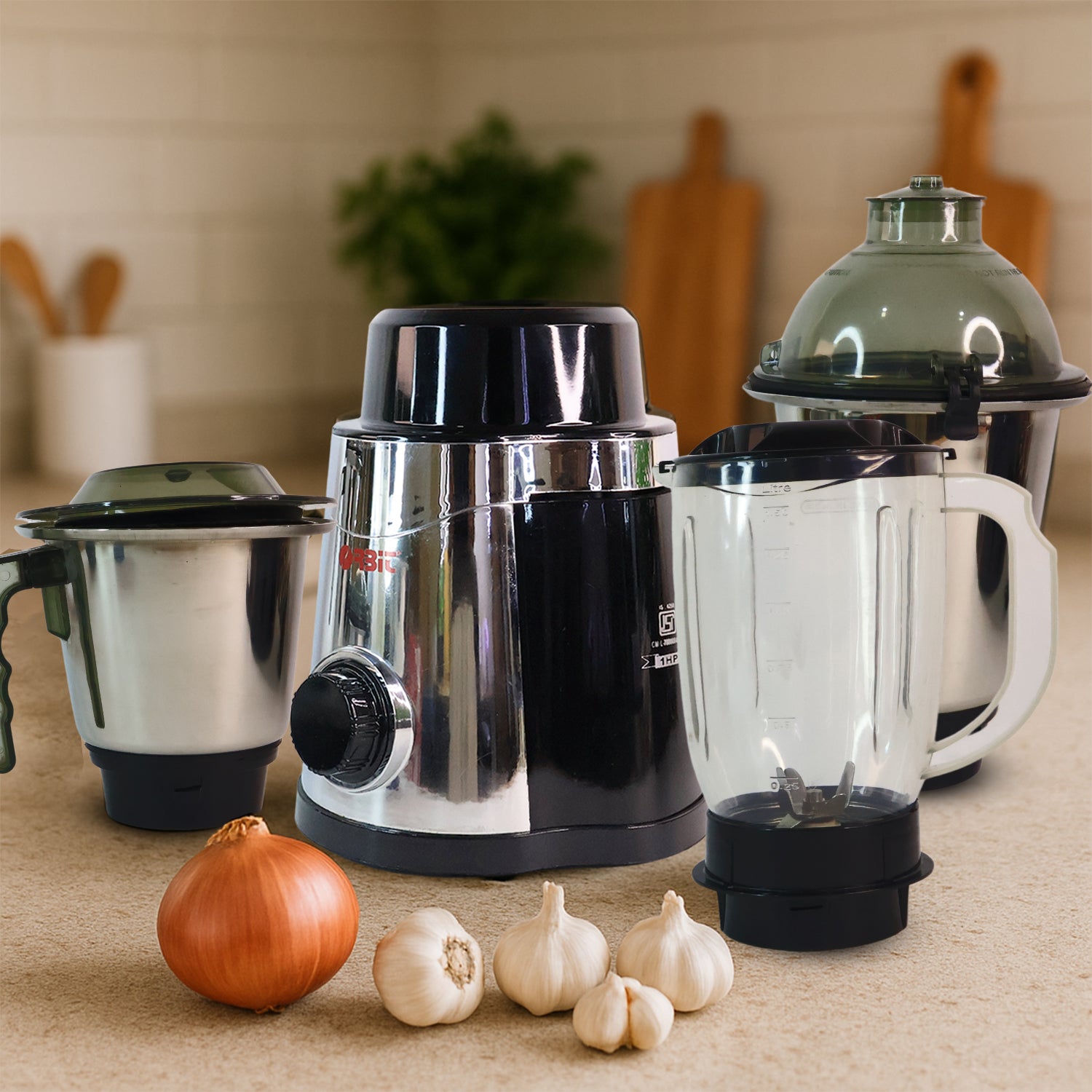 Wukusy Orbit Heavy Duty 1 HP mixer grinder with four multipurpose jars for home kitchen use, showcasing the appliance and jars.