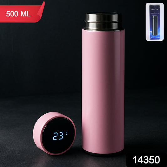 Pink Wukusy vacuum insulated water bottle, 500ml, for hot and cold drinks, in a sleek home and kitchen setting.