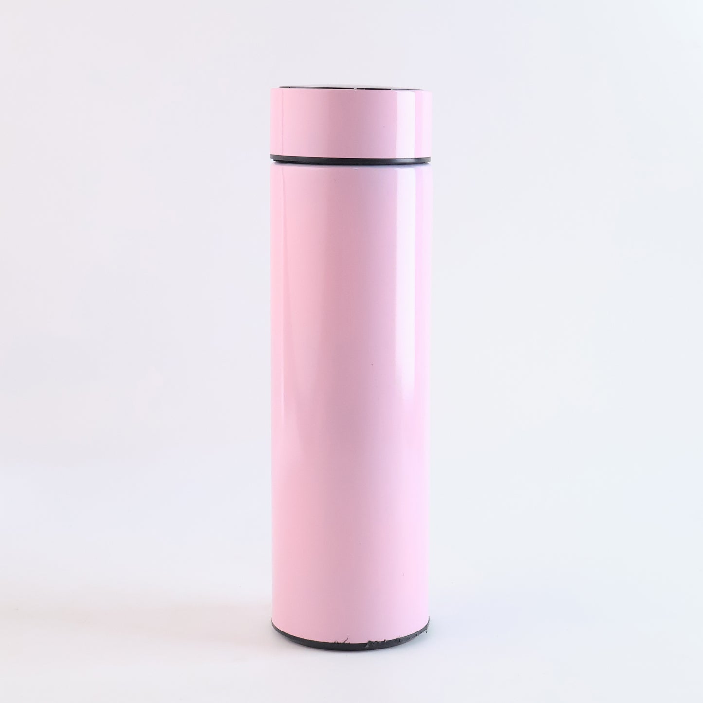 Pink vacuum insulated water bottle by Wukusy, 500ml, in a sleek design, perfect for keeping drinks hot or cold.