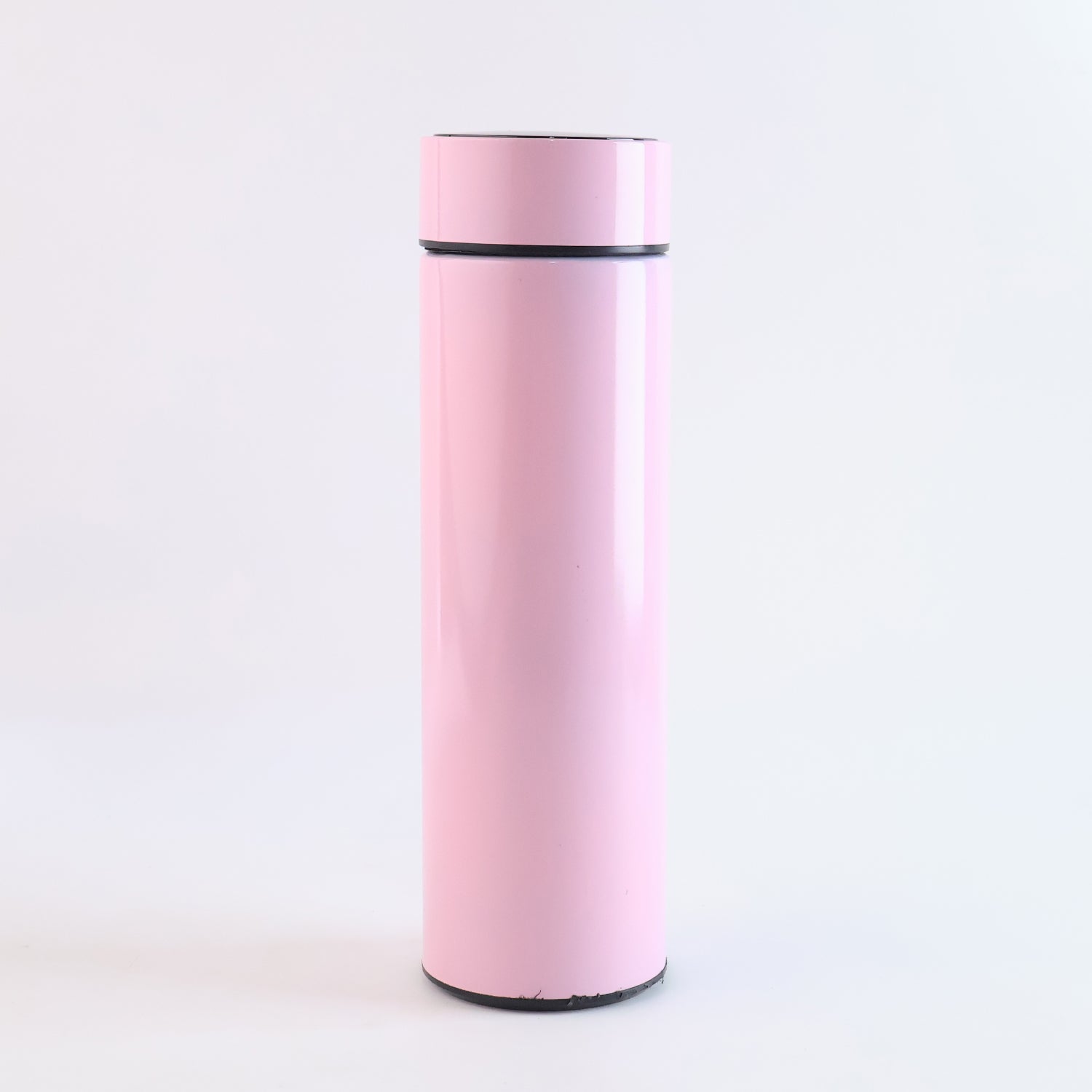 Pink vacuum insulated water bottle by Wukusy, 500ml, in a sleek design, perfect for keeping drinks hot or cold.