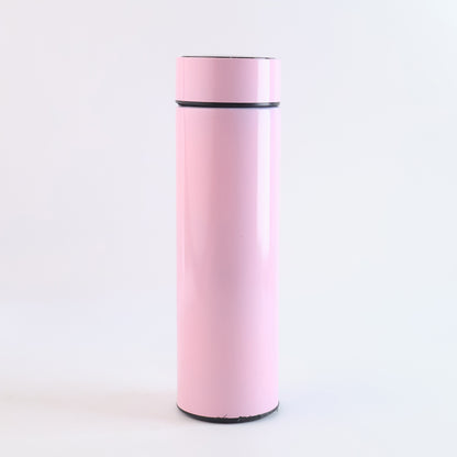 Pink vacuum insulated water bottle by Wukusy, 500ml, in a sleek design, perfect for keeping drinks hot or cold.