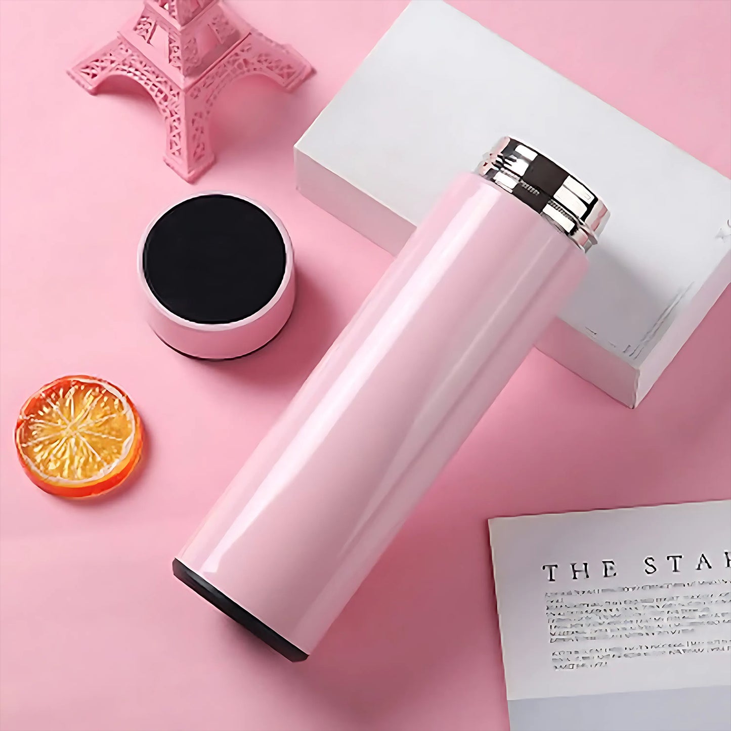Pink vacuum insulated water bottle by Wukusy, 500ml, perfect for keeping drinks hot or cold in home and kitchen use.