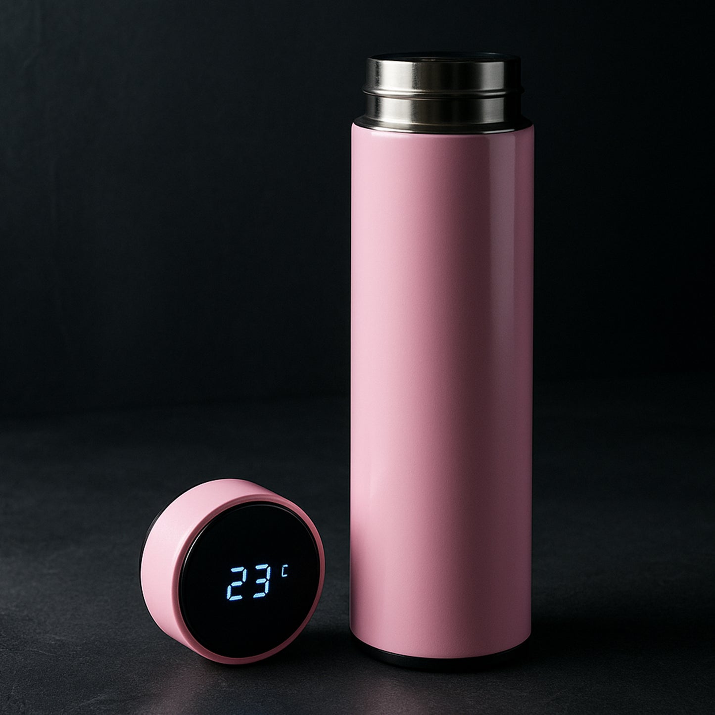 Pink vacuum insulated water bottle by Wukusy, 500ml, made for home and kitchen use, with a sleek, portable design.