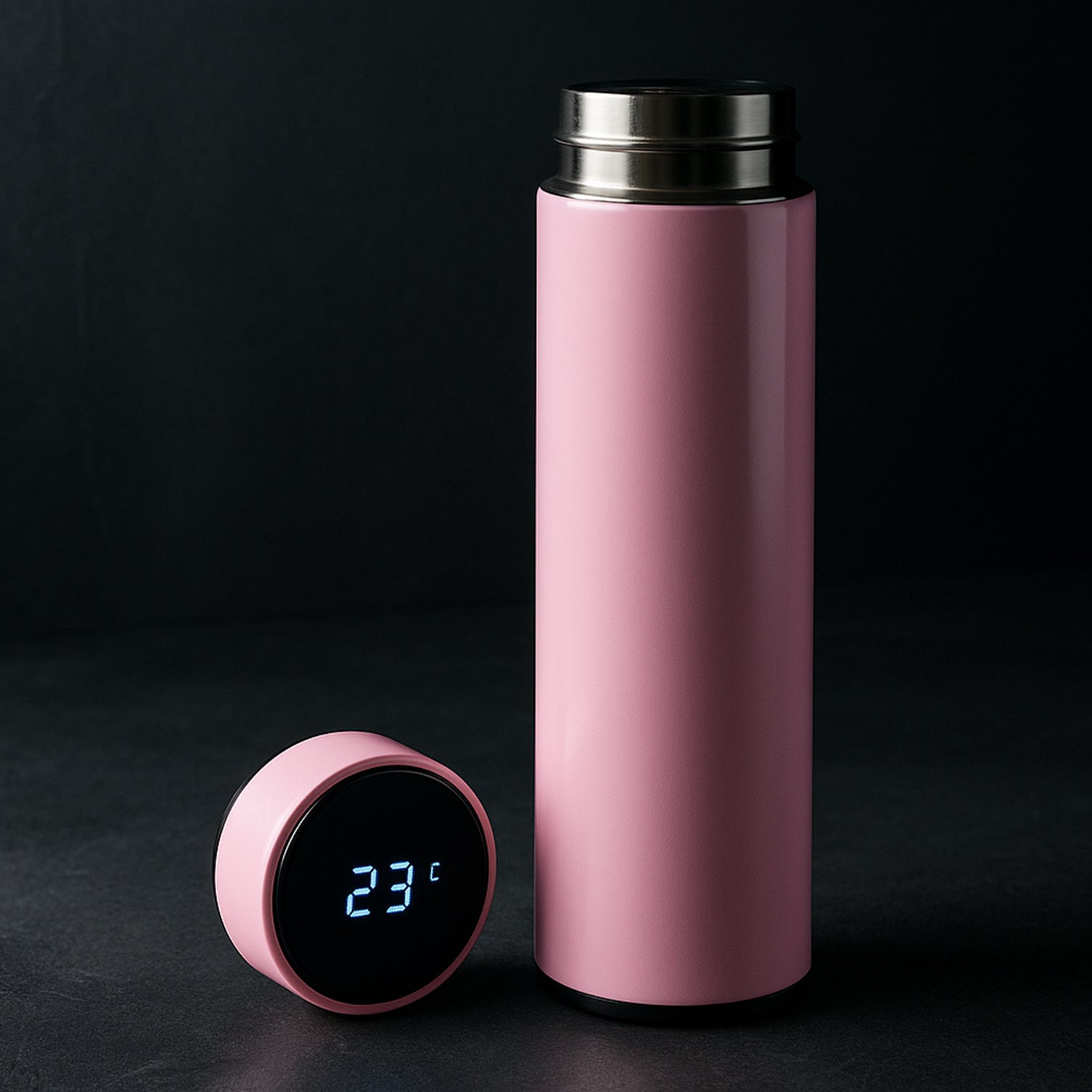 Pink vacuum insulated water bottle by Wukusy, 500ml, made for home and kitchen use, with a sleek, portable design.