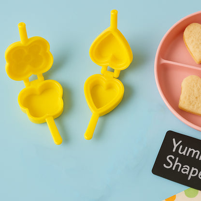 Wukusy plastic cookie cutter mould set with six different shapes for baking and cookie decorating in a home kitchen setting.