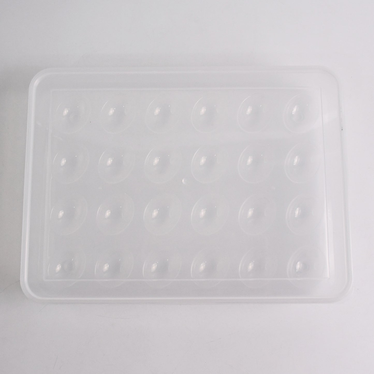 Wukusy plastic egg storage container for refrigerator, holds 24 eggs, kitchen organizer, clear plastic tray with lid.