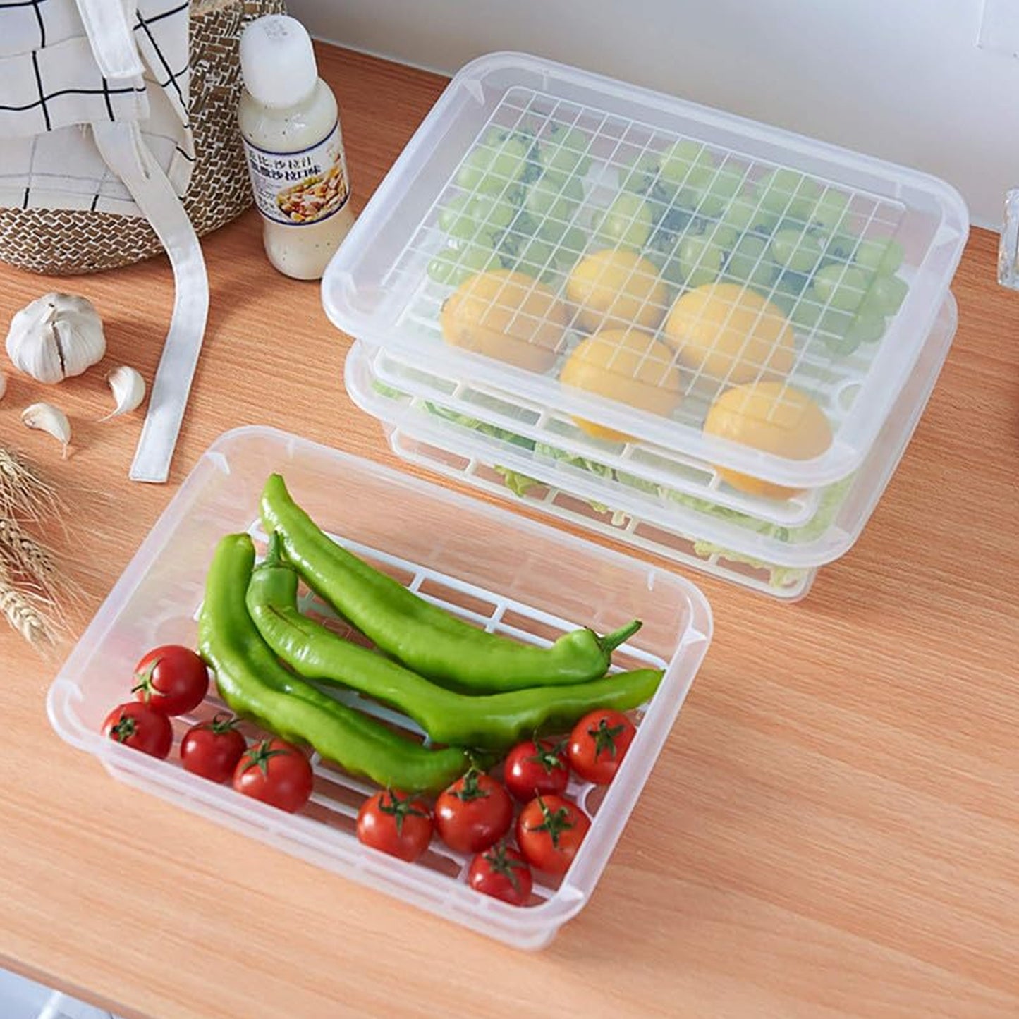 Wukusy plastic food storage containers with removable drain tray and lids, 3-piece set for kitchen organization and freshness.