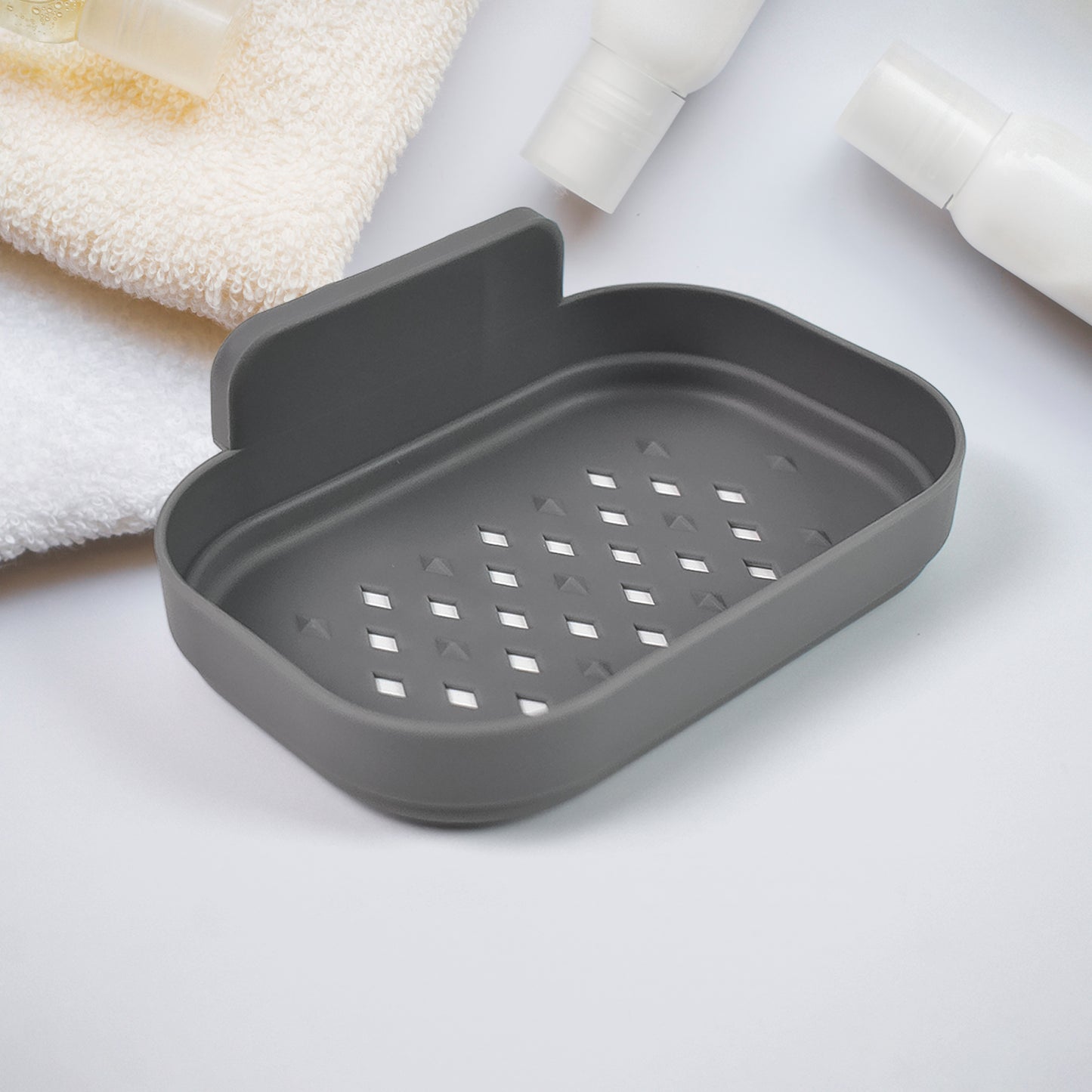Wall-mounted plastic soap dish holder by Wukusy for bathroom shower, self-adhesive, suitable for bathroom or kitchen use.
