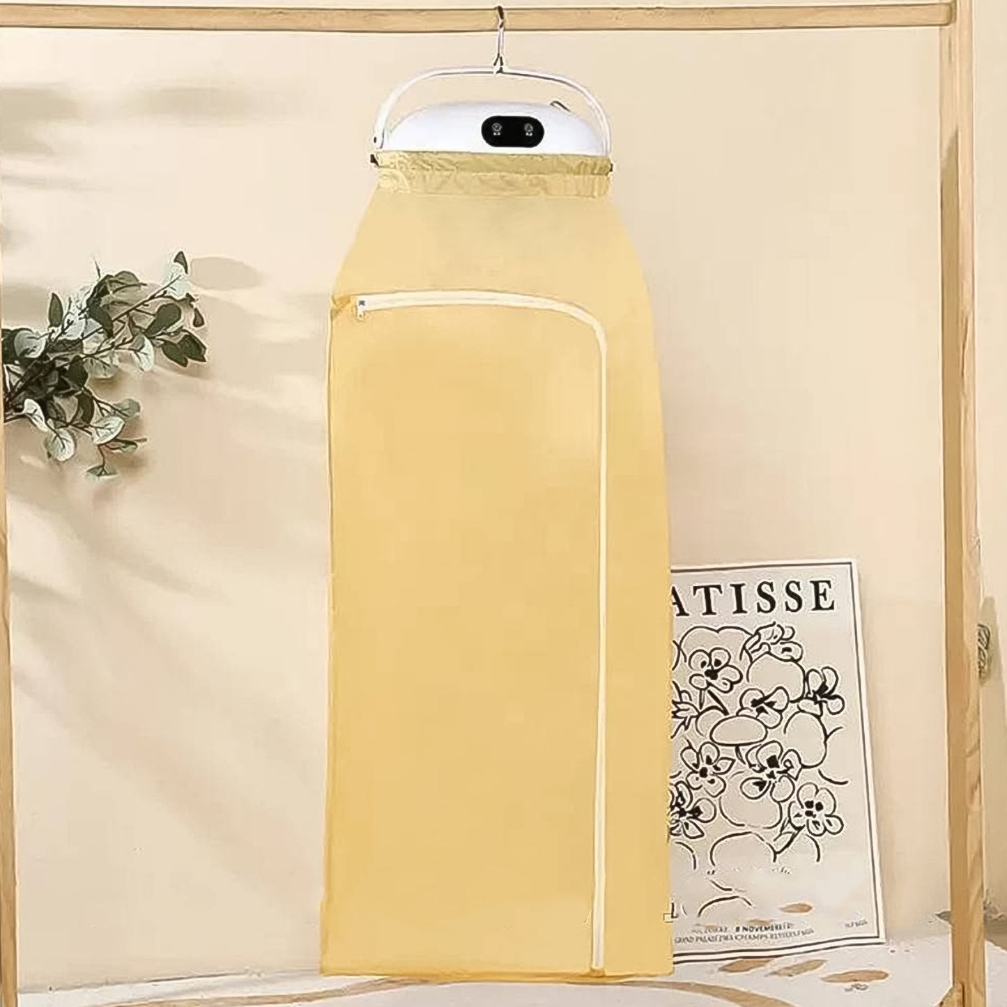 Wukusy portable clothes folding dryer for home and kitchen, compact design with drying racks and control panel.