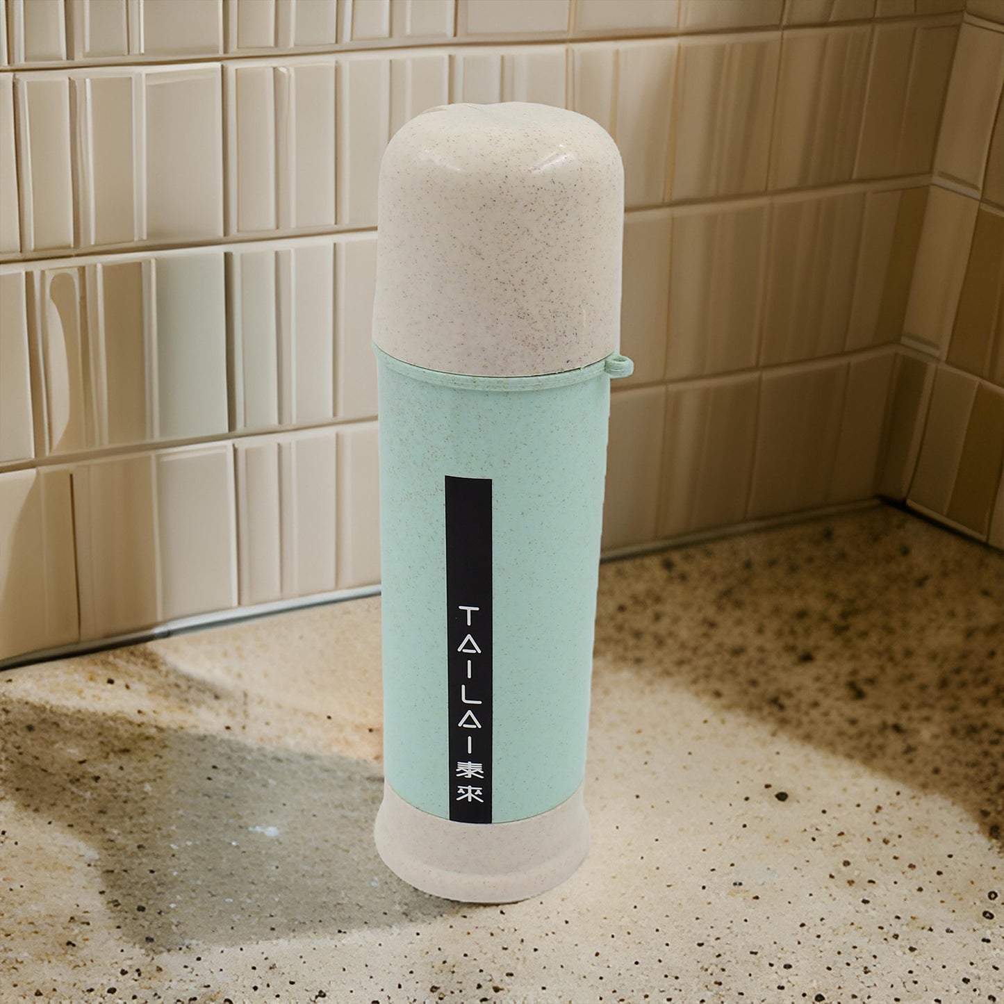 Wukusy portable water bottle, 300ml capacity, with a colorful mixed design, suitable for home and kitchen use.