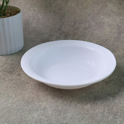 Deep round curry bowl by Wukusy, ceramic kitchenware perfect for serving curries and soups in a stylish home setting.