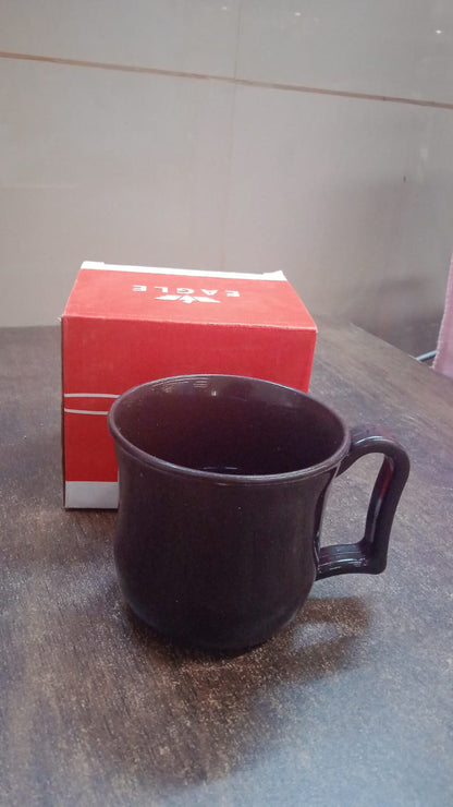 Black plastic coffee tea mug with handle from Wukusy, shown in a color box, ideal for home and kitchen use.