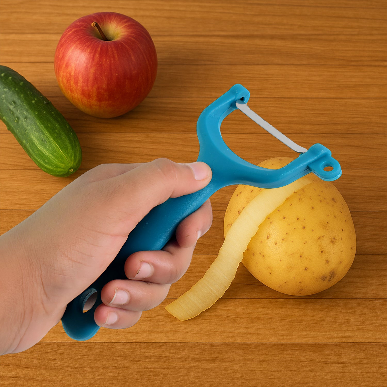 Wukusy Premium Ritu Peeler Plus for kitchen, white plastic handle and sharp stainless steel blade for peeling vegetables and fruits.